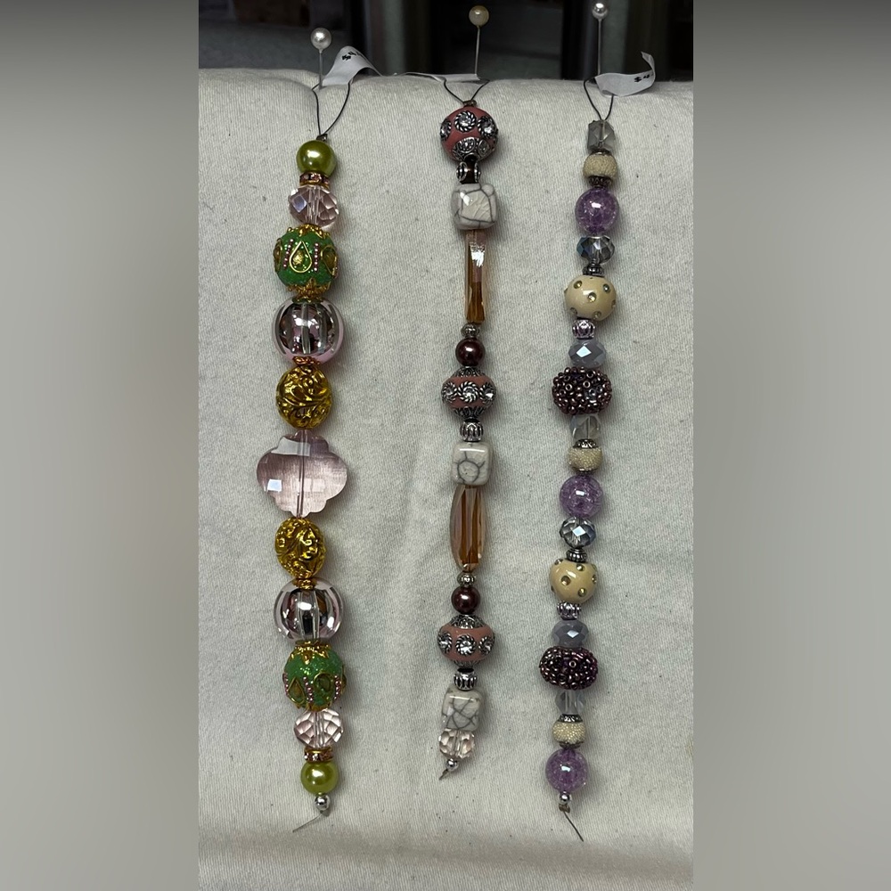 Jessie James Beads in pinks, purples and greens